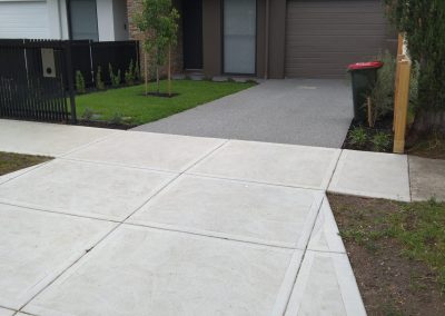 Plain Concrete Driveway - Brick Home
